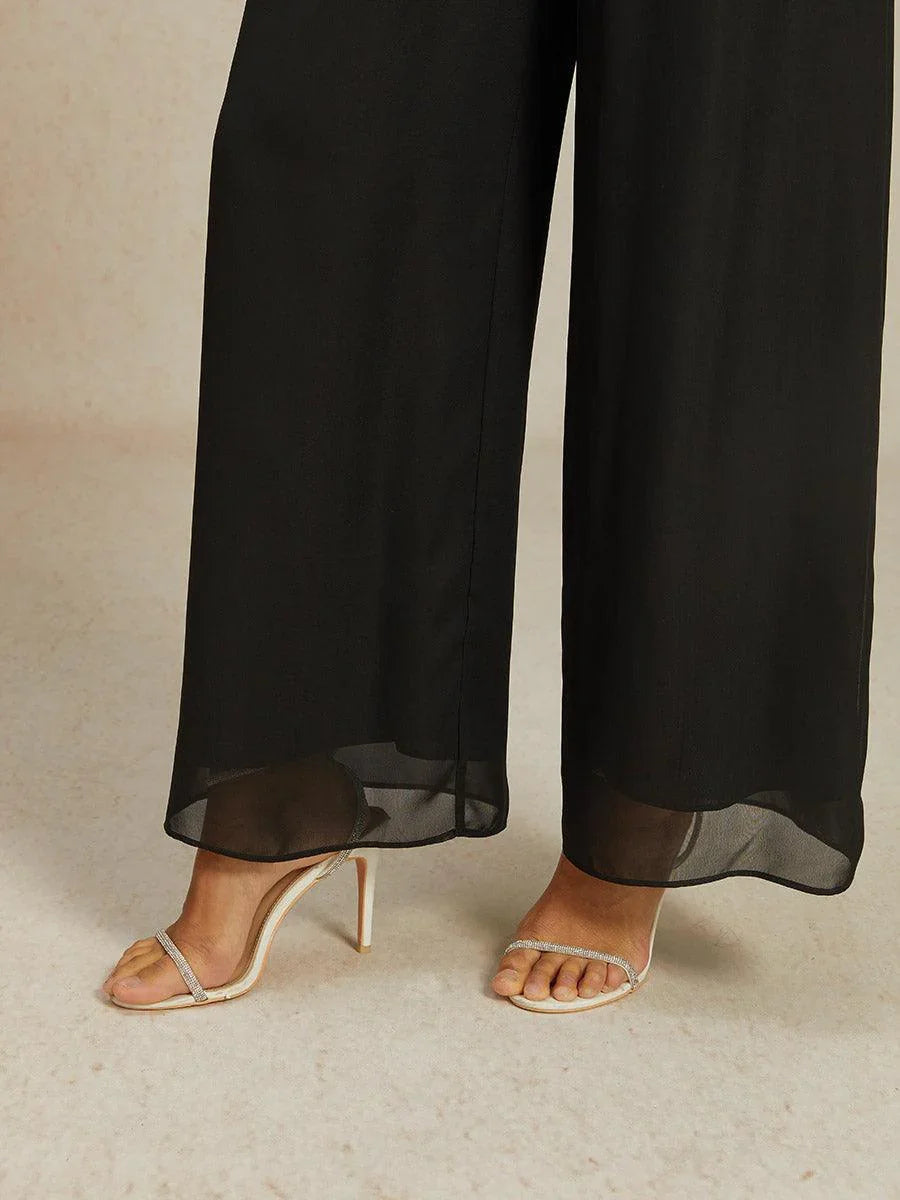 Pantalon en chiffon à jambe large avec taille élastique à hauteur moyenne