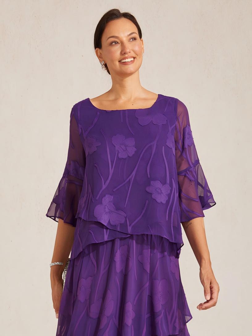 Chemise en soie avec des bords asymétriques