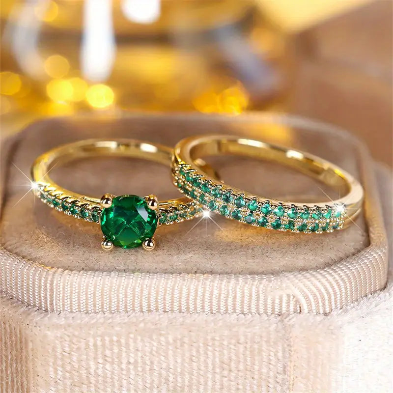 Bague double avec pierre émeraude en or