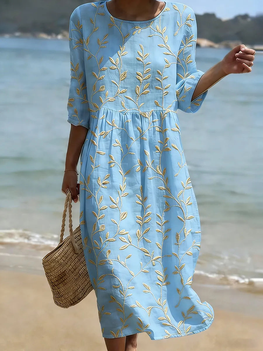 Natalie | Robe midi avec décolleté rond et imprimé floral