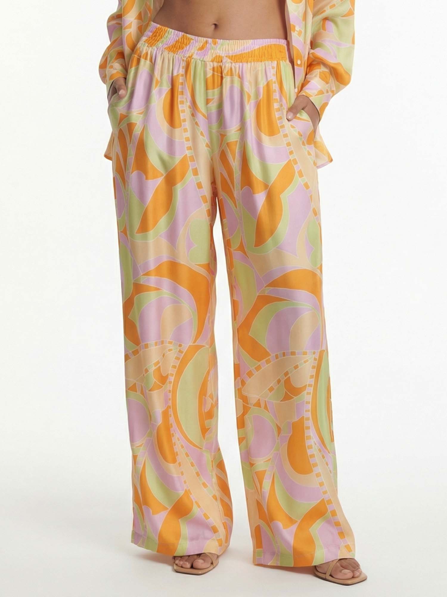 Pantalons larges avec imprimé graphique plage tropicale