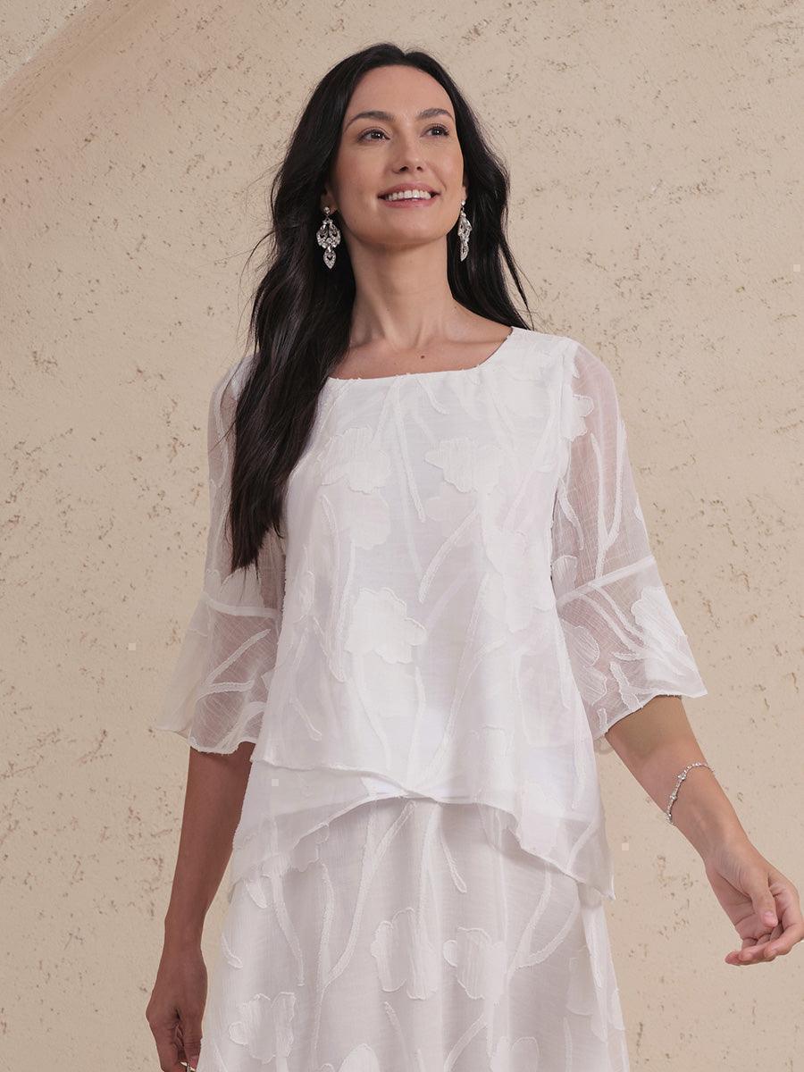 Blouse en chiffon avec des bords asymétriques