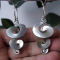 Boucles d'oreilles vintage en argent torsadé