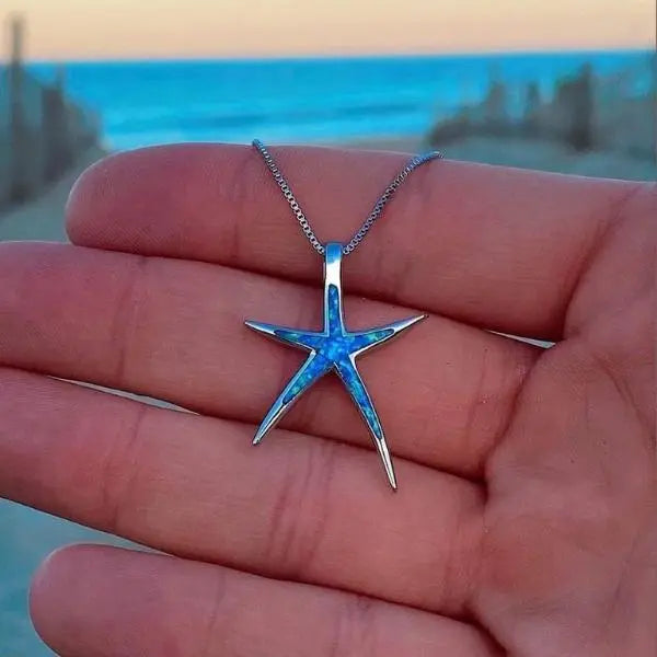 Pendentif étoile de mer en argent avec opale bleue