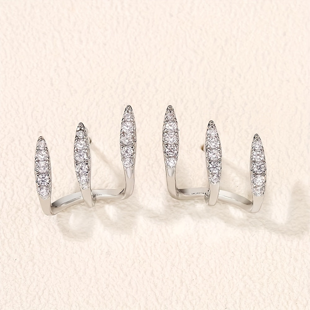 Boucles d'oreilles élégantes avec pierres précieuses en trois supports