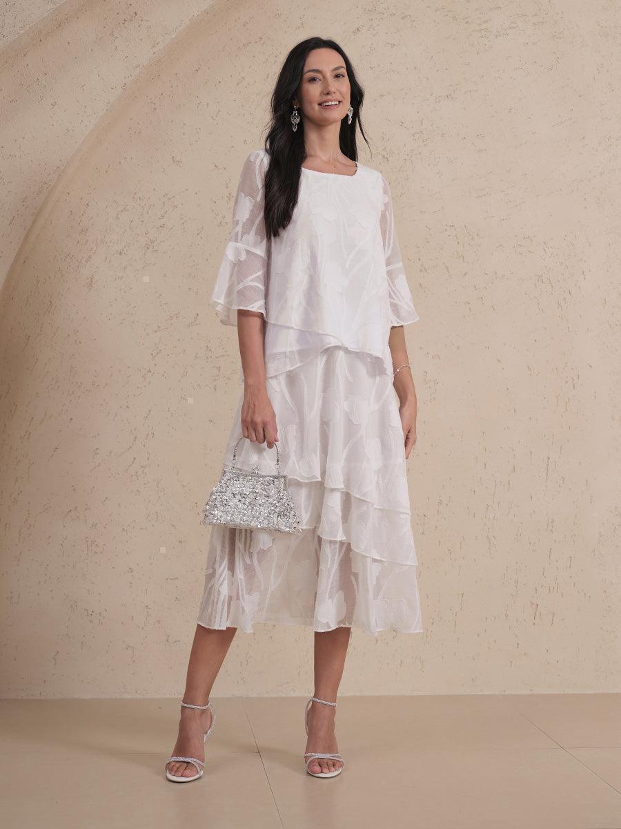 Blouse en chiffon avec des bords asymétriques