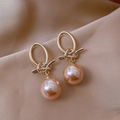 Boucles d'oreilles pendantes avec perle éternelle