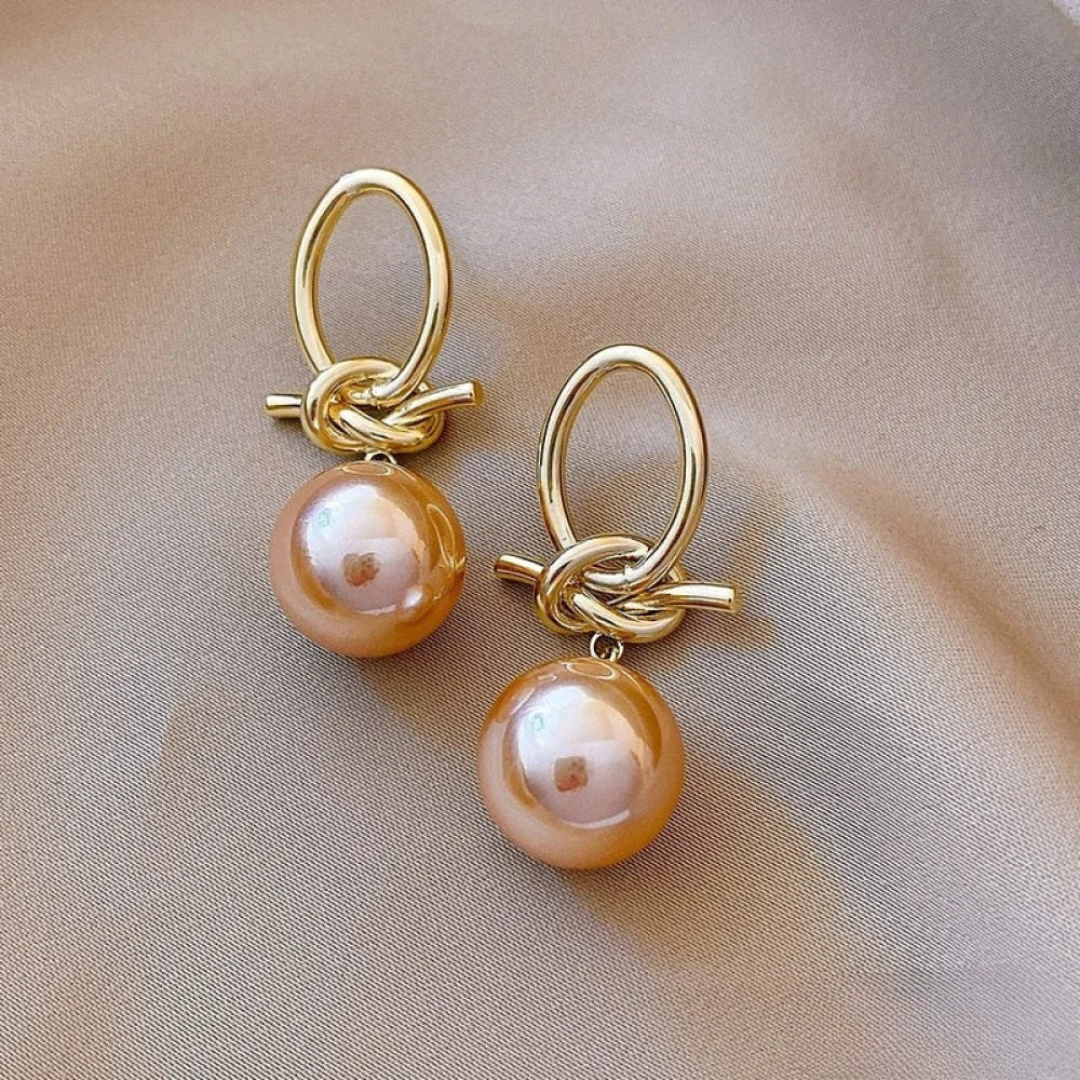 Boucles d'oreilles pendantes avec perle éternelle
