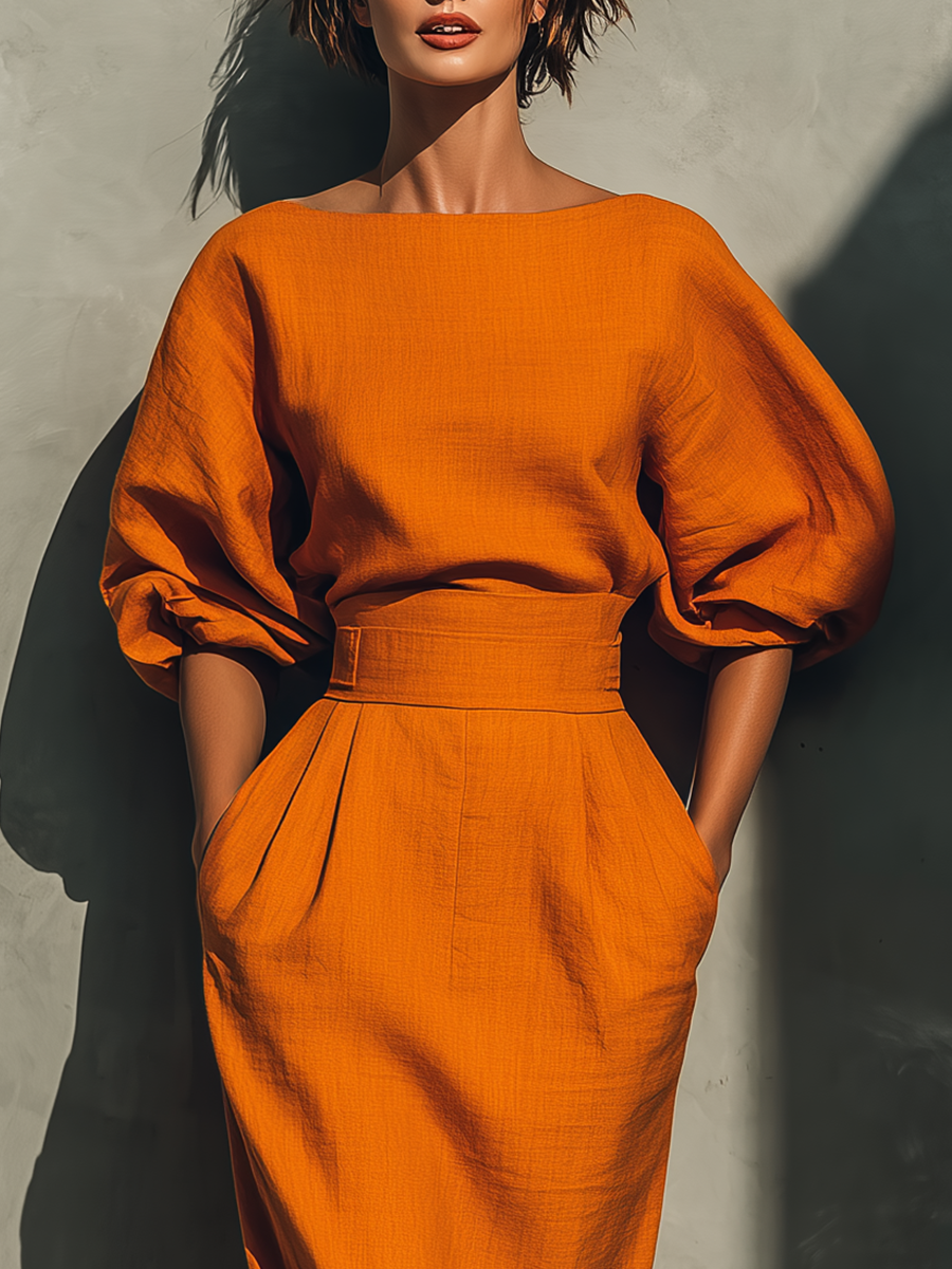 Ensemble top à manches moyennes et jupe midi pour femmes en orange MDA2511G6T