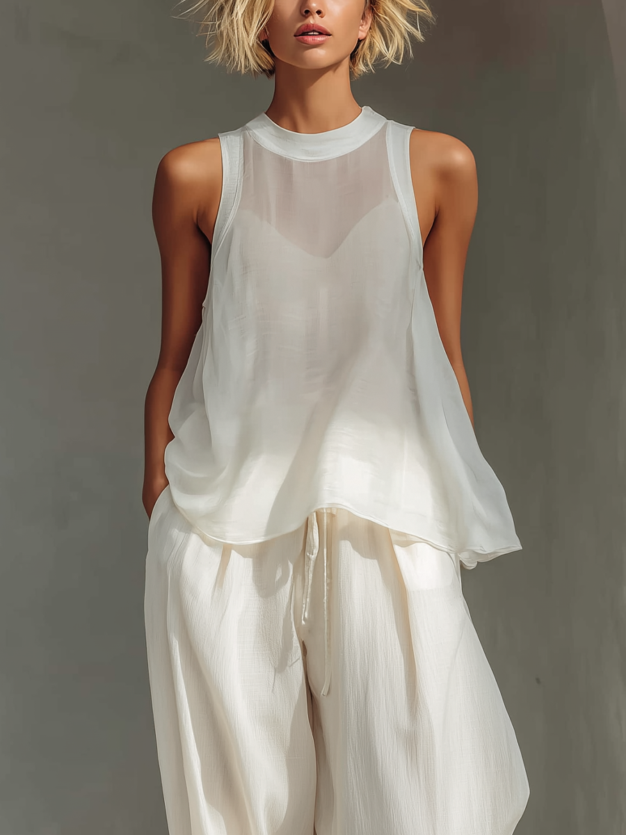 Ensemble deux pièces pour femmes en couleur crème avec un top sans manches en soie transparente et une jupe ample en tissu de coton et lin MDZ1039C4T