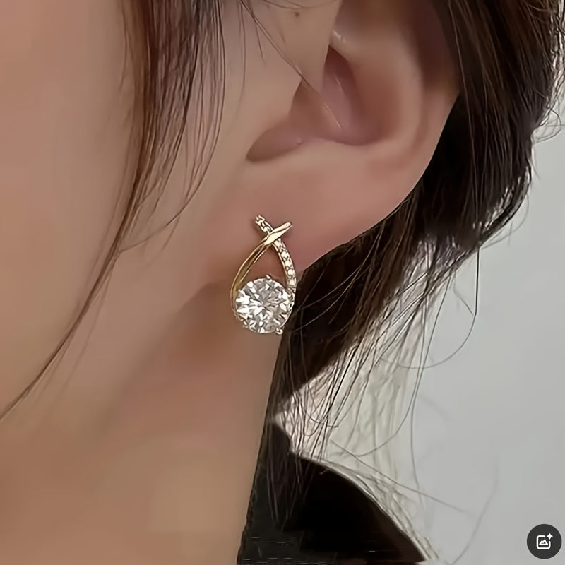 Boucles d'oreilles en forme de clou avec croix en or et zirconiums