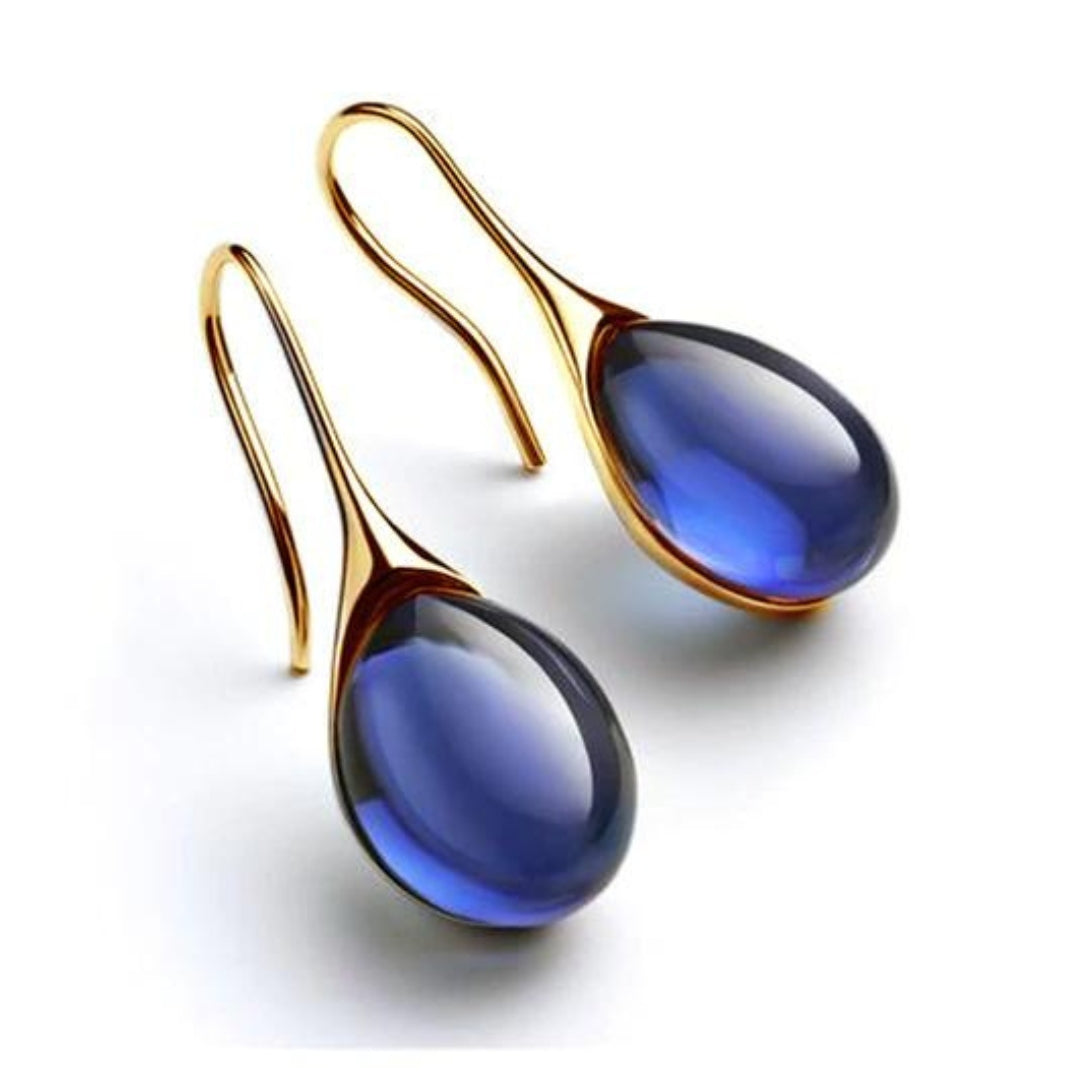 Boucles d'oreilles pendantes élégantes avec des cristaux