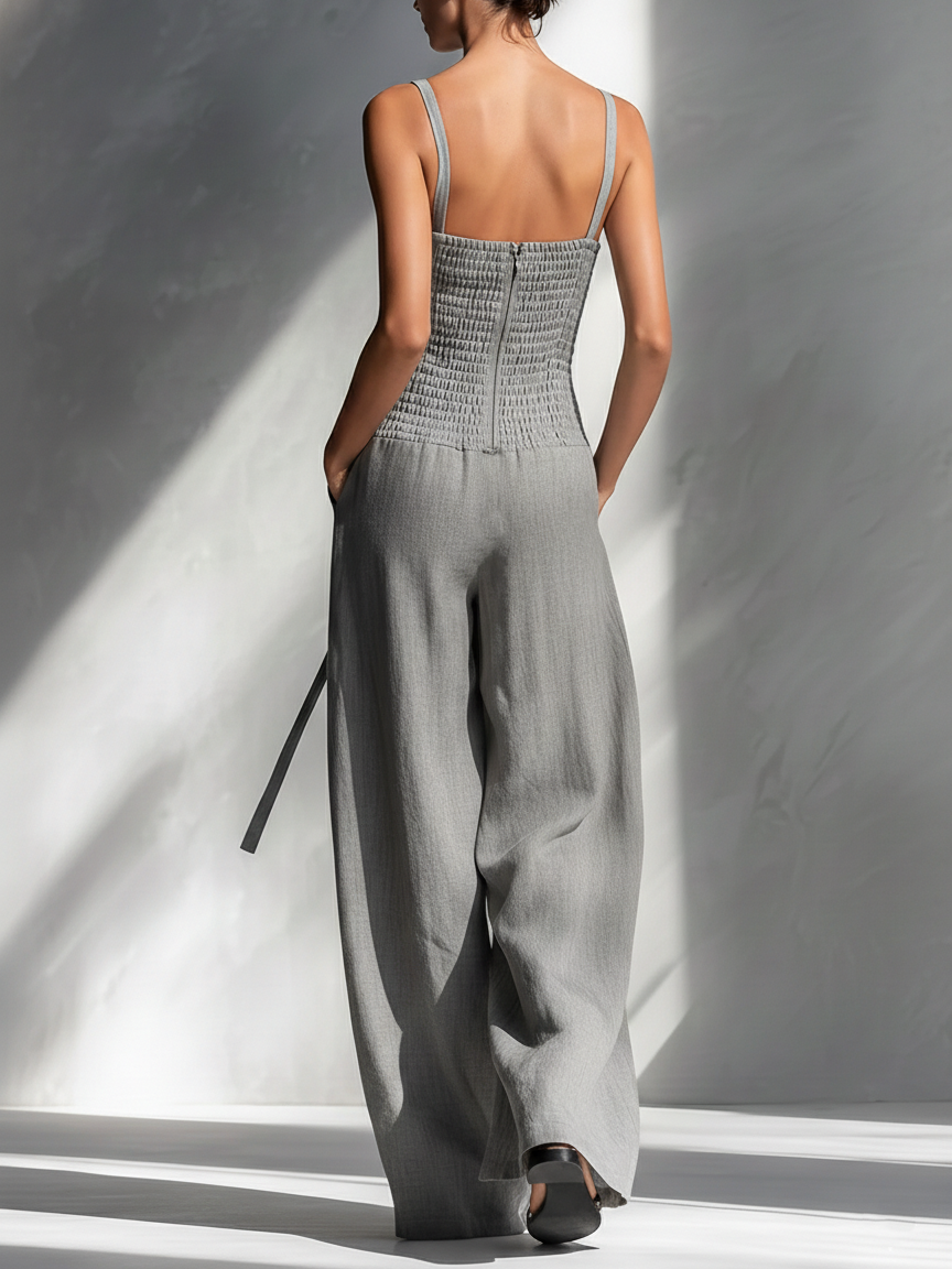 Salopette femme minimaliste en lin gris avec bretelles spaghetti, col carré, ceinture à nouer et pantalons larges MDA2666L5AU