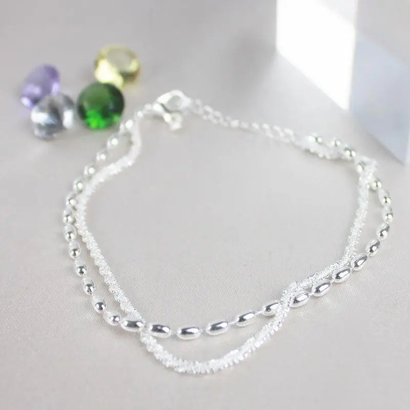 Ensemble de bracelets élégants en argent avec des pierres de zircon