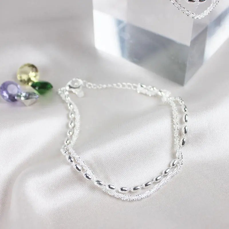 Ensemble de bracelets élégants en argent avec des pierres de zircon