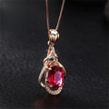 Collier élégant avec des cristaux rouges et or
