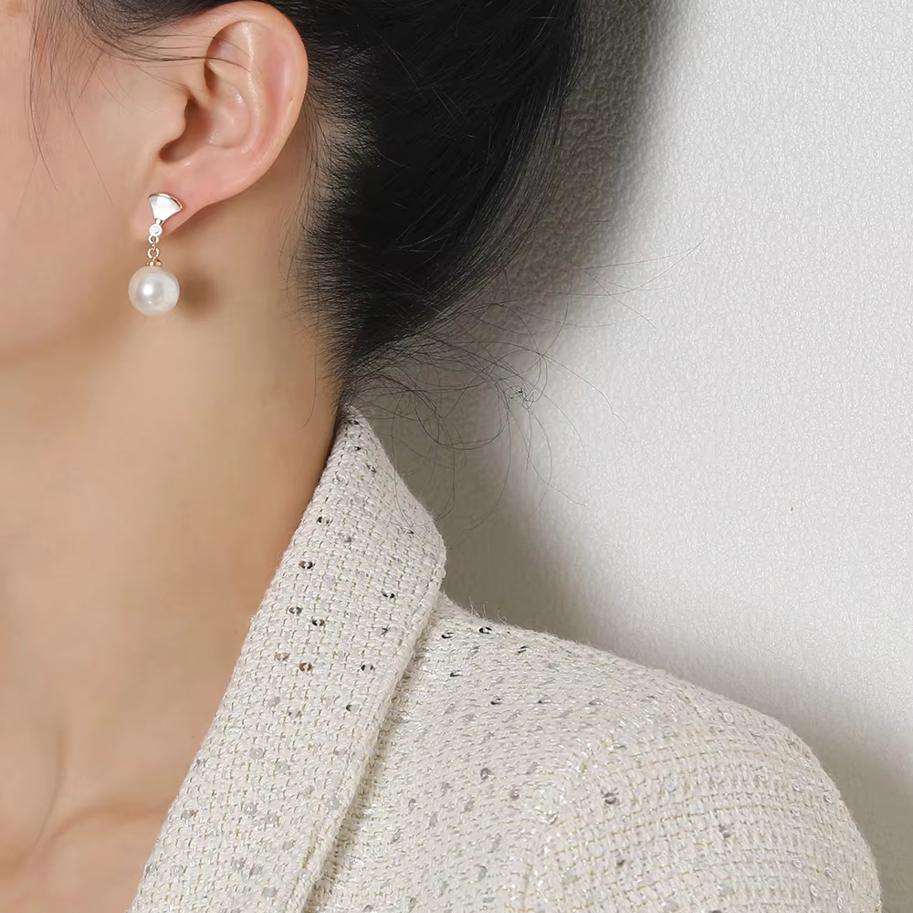 Boucles d'oreilles en argent élégantes avec perle