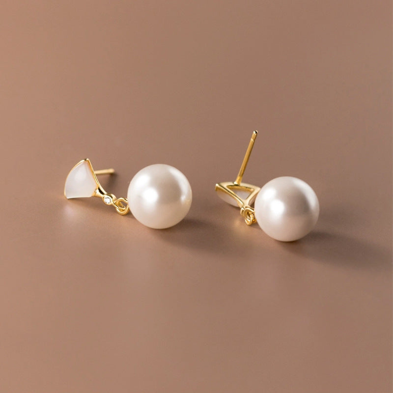 Boucles d'oreilles en argent élégantes avec perle