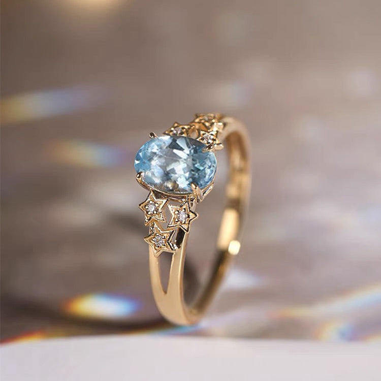 Bague de luxe en or avec cristal bleu