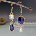 Boucles d'oreilles de luxe avec pierre bleue et perle