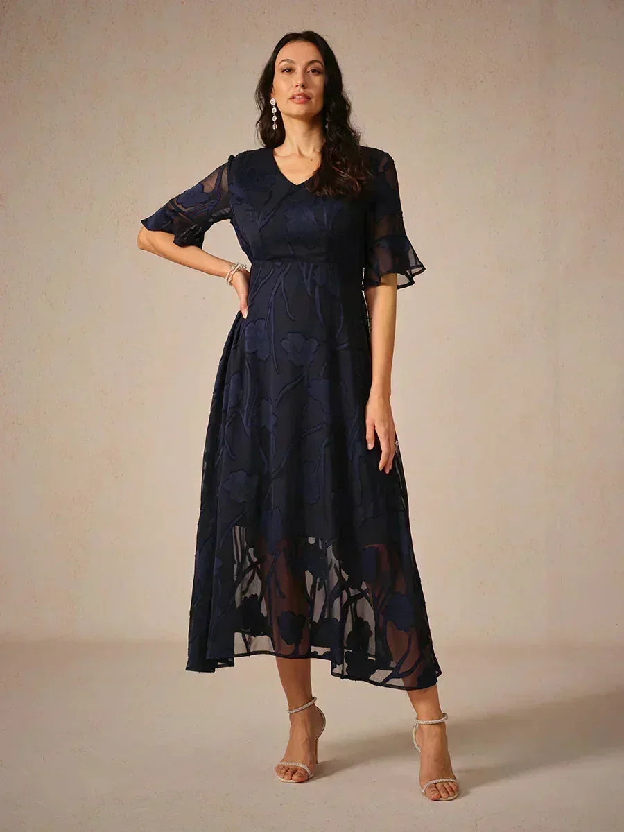 Robes maxi en dentelle avec traîne