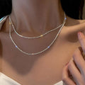 Collier à couches doubles avec cristaux
