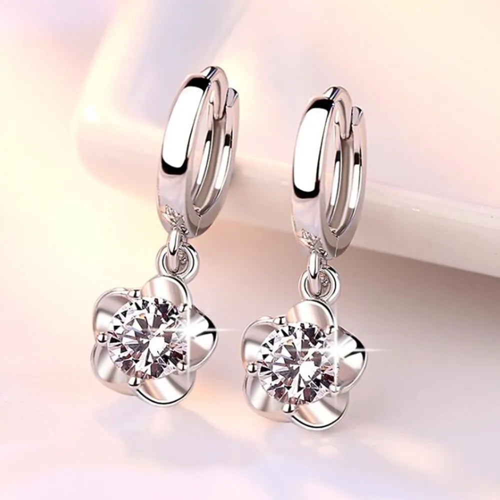 Boucles d'oreilles en argent sterling avec des zirconiums violets et blancs