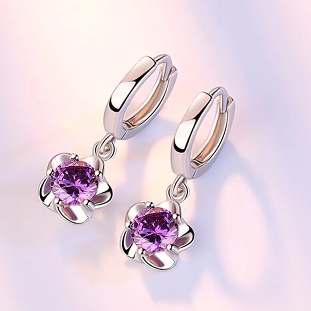 Boucles d'oreilles en argent sterling avec des zirconiums violets et blancs