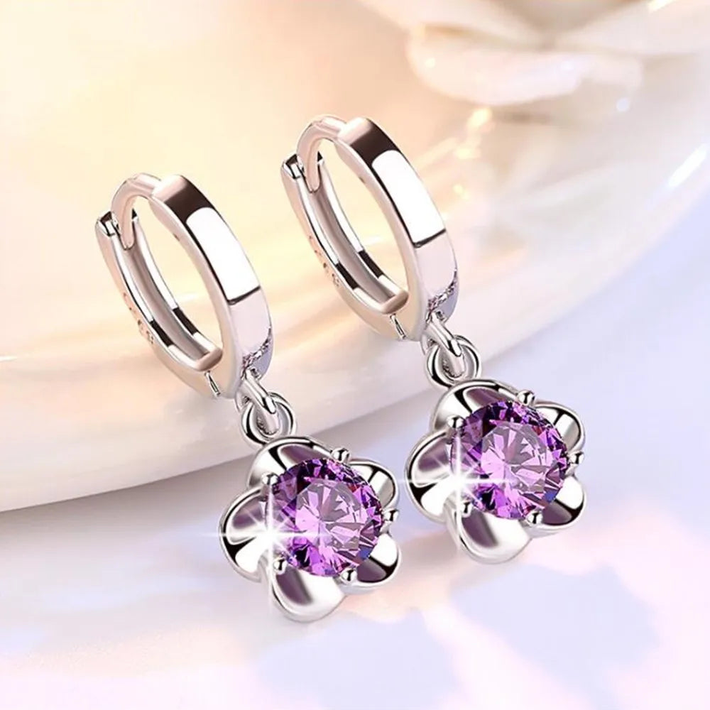 Boucles d'oreilles en argent sterling avec des zirconiums violets et blancs