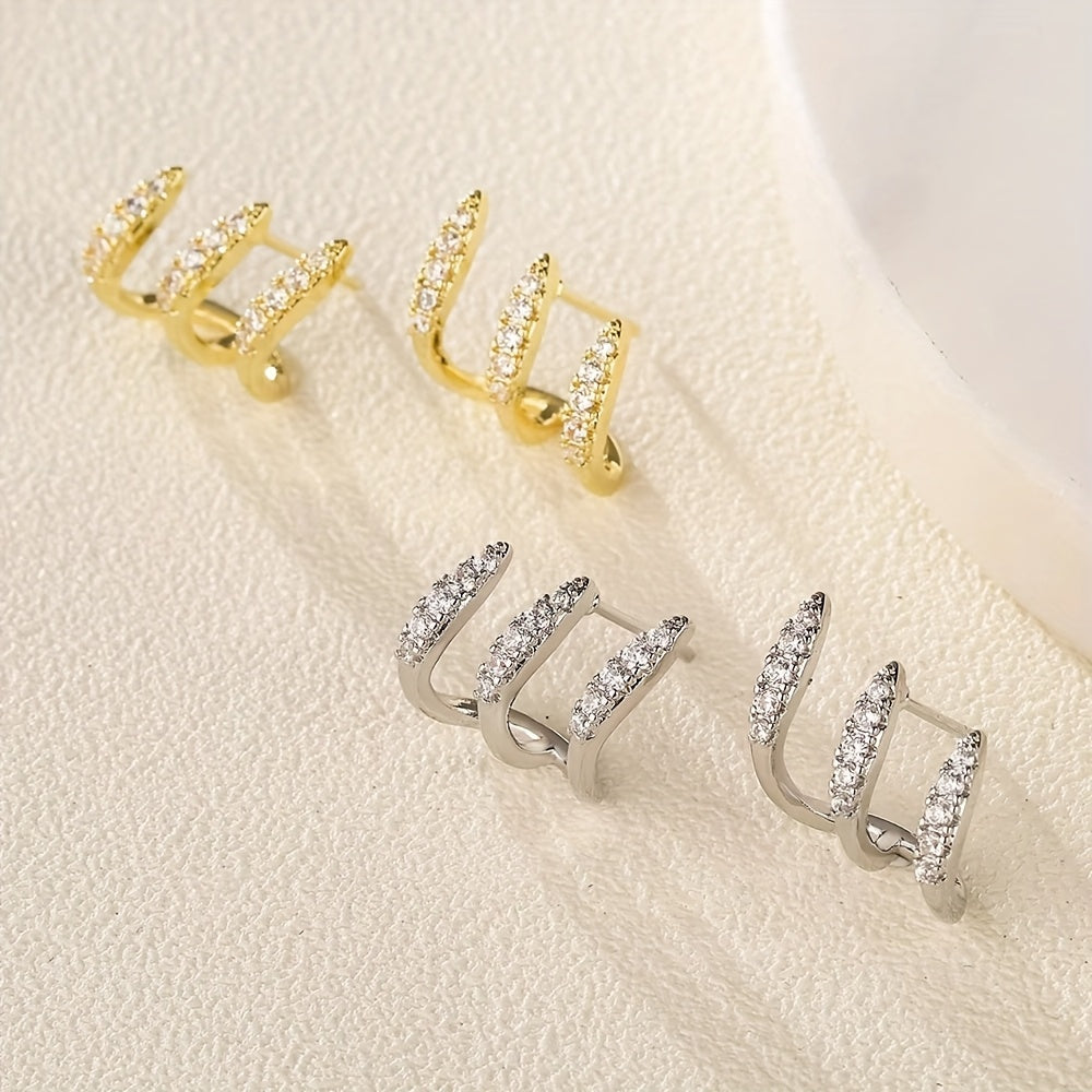 Boucles d'oreilles élégantes avec pierres précieuses en trois supports