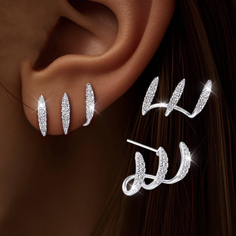 Boucles d'oreilles élégantes avec pierres précieuses en trois supports