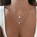Ensemble de pendentifs sophistiqués avec cœur et perles