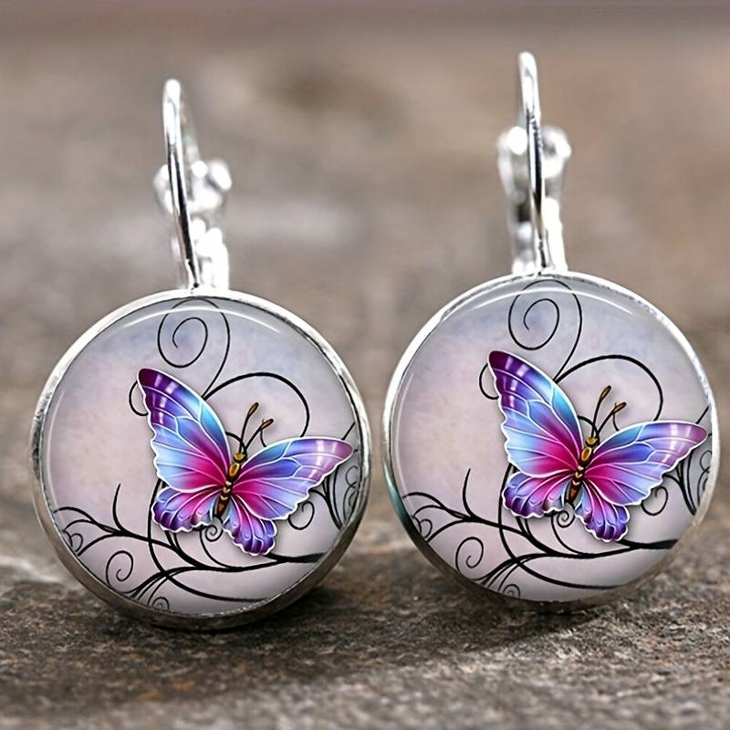 Boucles d'oreilles vintage en papillon avec des cristaux ronds