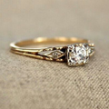 Bague en or délicate vintage avec zircons