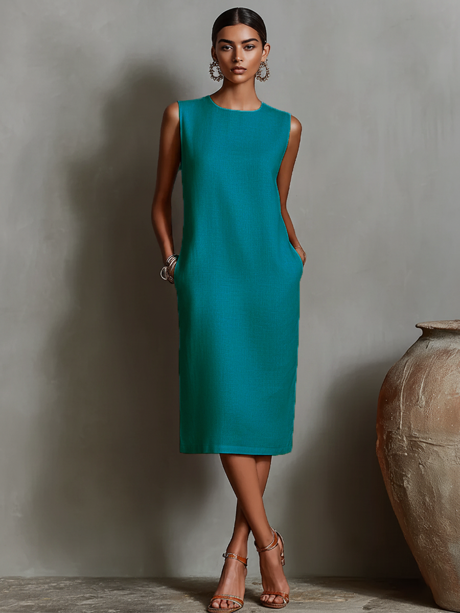 Robe en lin orange pour femmes avec col rond sans manches et poches latérales, style minimaliste-élégant intemporel MDZ2851C7I